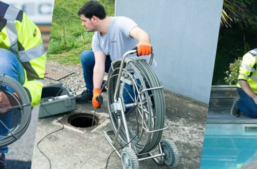 Technicien utilisant une caméra d'inspection avec sonde de détection sur un réseau enterré, dévidoir et récepteur en main